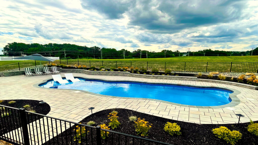 Curved fiberglass pool from San Juan